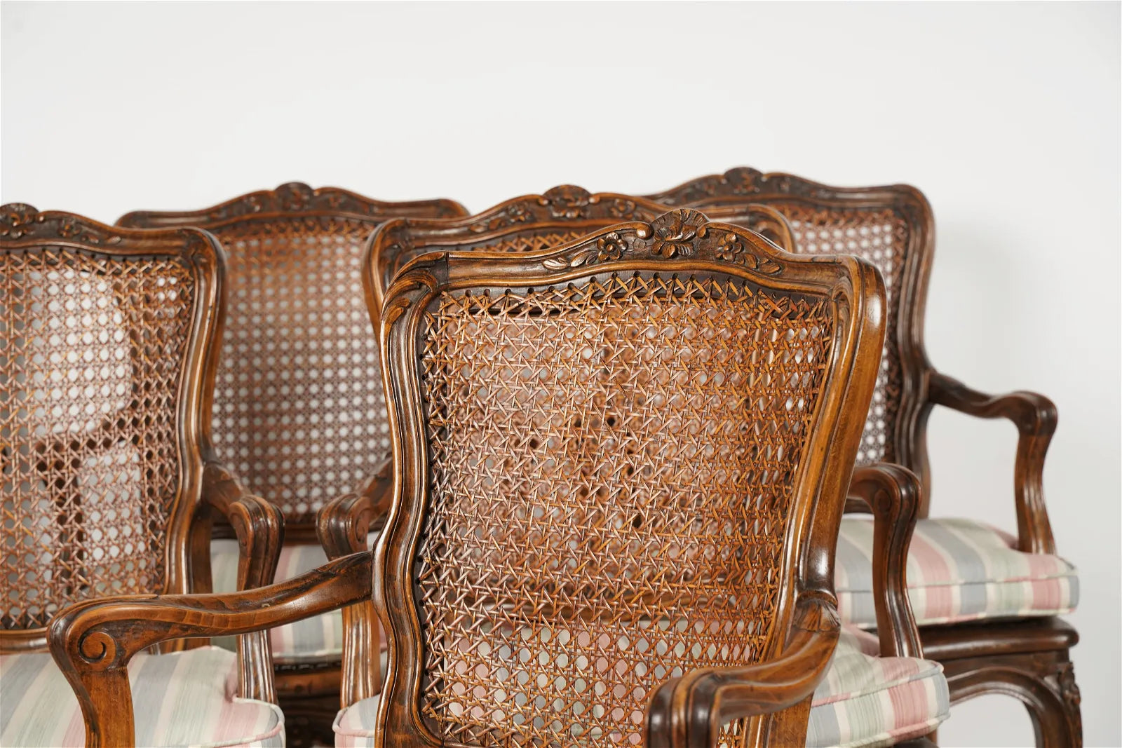 AF2-157: Antique Set of 6 20th Century  French Provincial Style Walnut Stained Beechwood Caned Armchairs