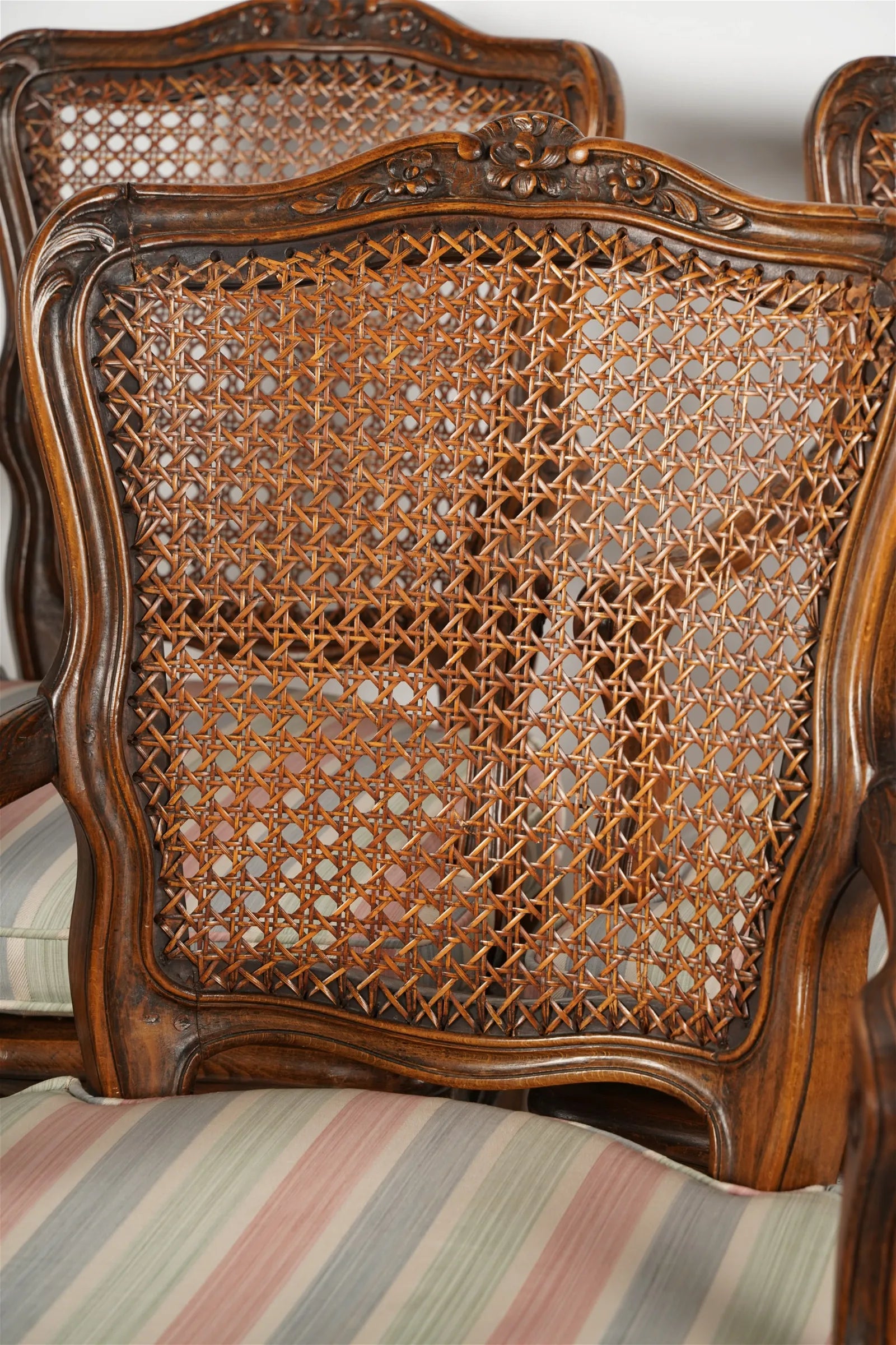 AF2-157: Antique Set of 6 20th Century  French Provincial Style Walnut Stained Beechwood Caned Armchairs