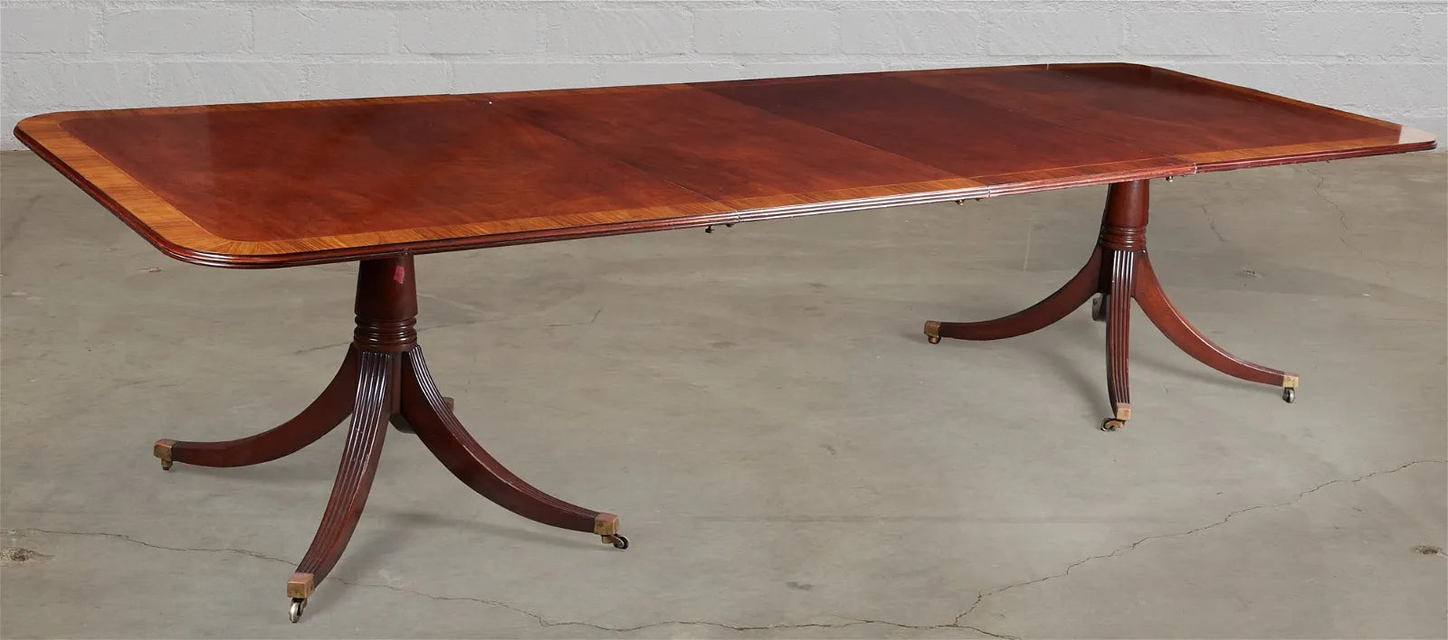 AF1-395: 20th Century English Georgian Double Pedestal Mahogany Dining Table w/ Cross Banded Border & 2 Leaves