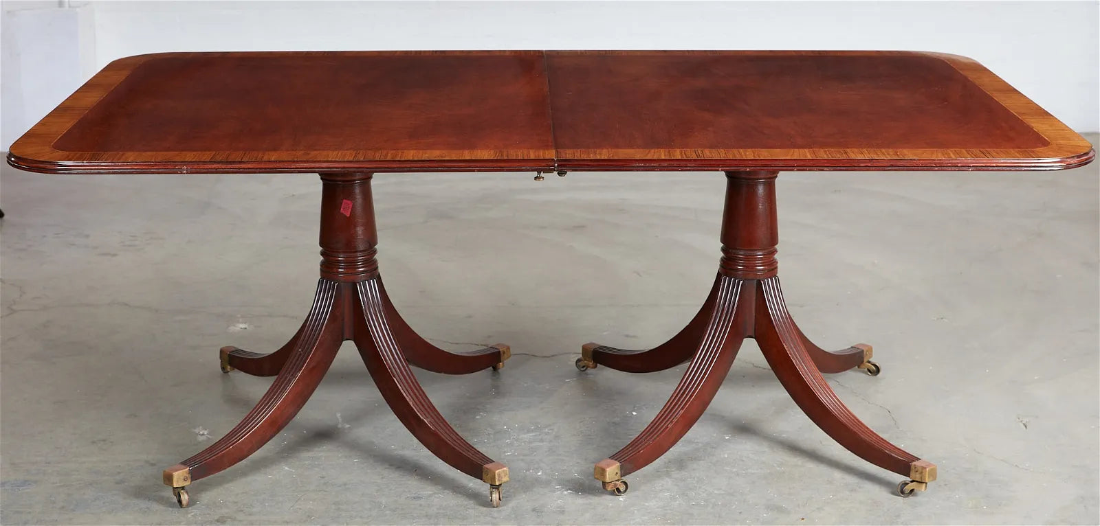 AF1-395: 20th Century English Georgian Double Pedestal Mahogany Dining Table w/ Cross Banded Border & 2 Leaves