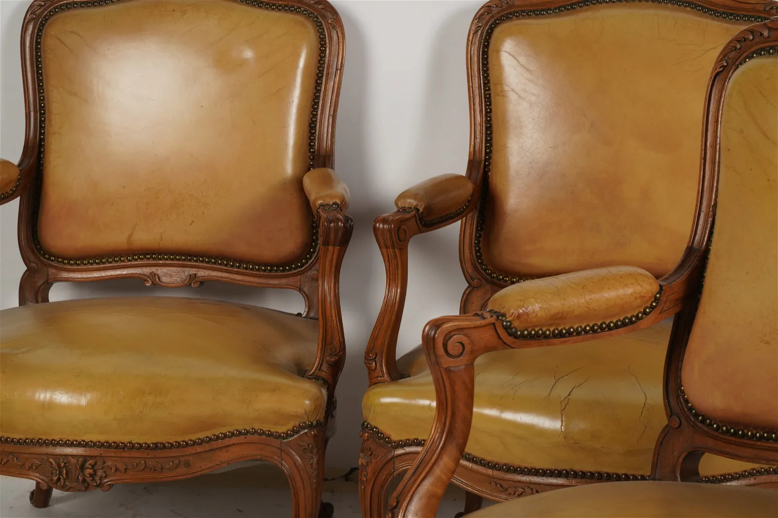 AF2-036: Antique Pair of Late 20th Century French Provincial Fruitwood Fauteuils w/ Leather Upholstery