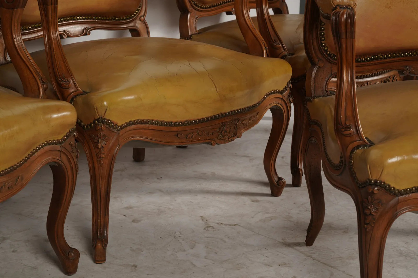 AF2-036: Antique Pair of Late 20th Century French Provincial Fruitwood Fauteuils w/ Leather Upholstery