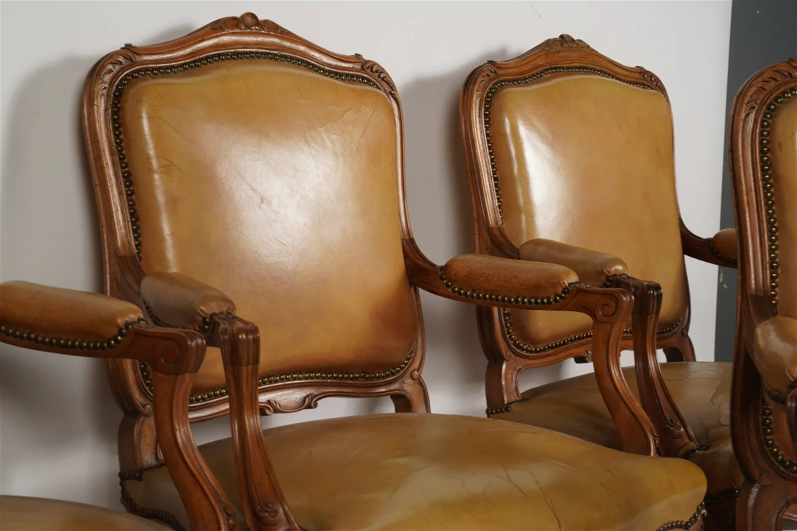 AF2-036: Antique Pair of Late 20th Century French Provincial Fruitwood Fauteuils w/ Leather Upholstery