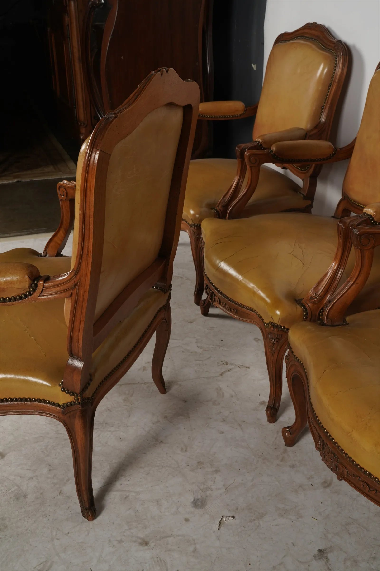 AF2-036: Antique Pair of Late 20th Century French Provincial Fruitwood Fauteuils w/ Leather Upholstery