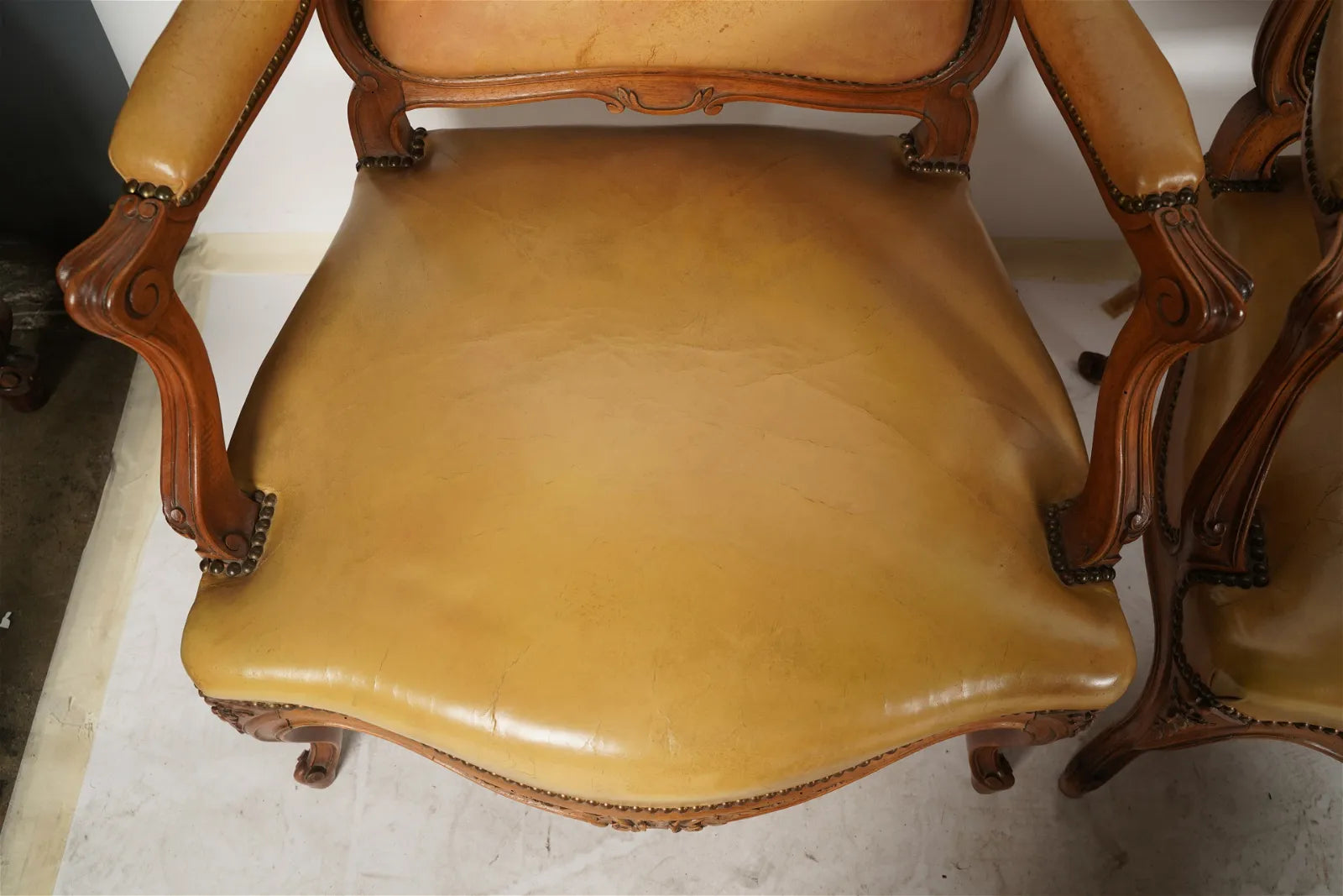 AF2-036: Antique Pair of Late 20th Century French Provincial Fruitwood Fauteuils w/ Leather Upholstery