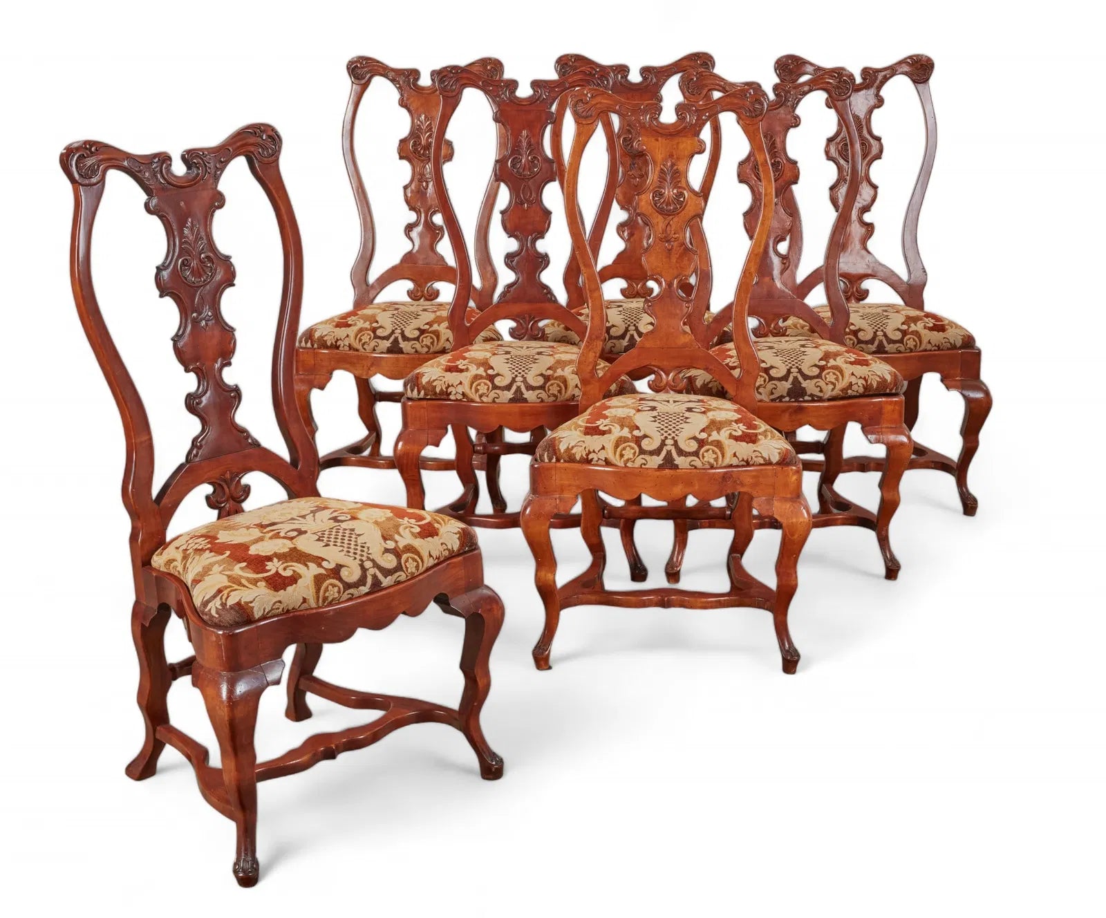 Set of 7 Portuguese Baroque Style Highly Carved Dining Chairs  | Work of Man