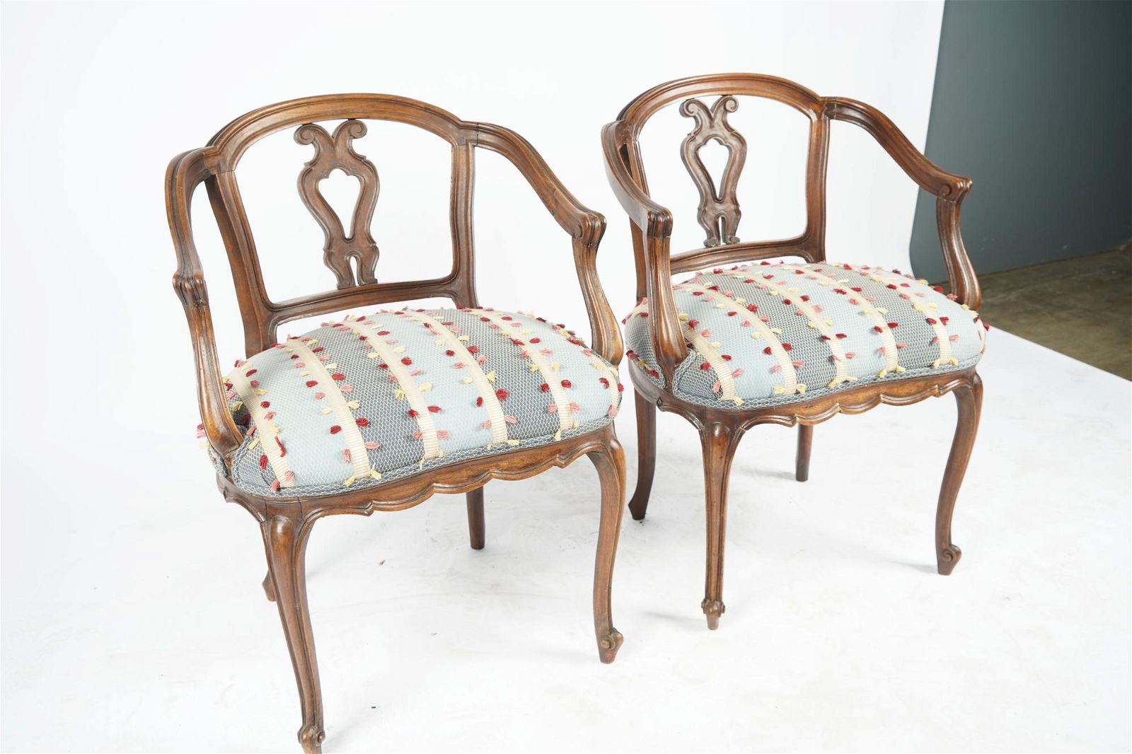 AF2-014: ANTIQUE PAIR OF LATE 19TH CENTURY FRENCH PROVINCIAL CARVED WALNUT ARMCHAIRS