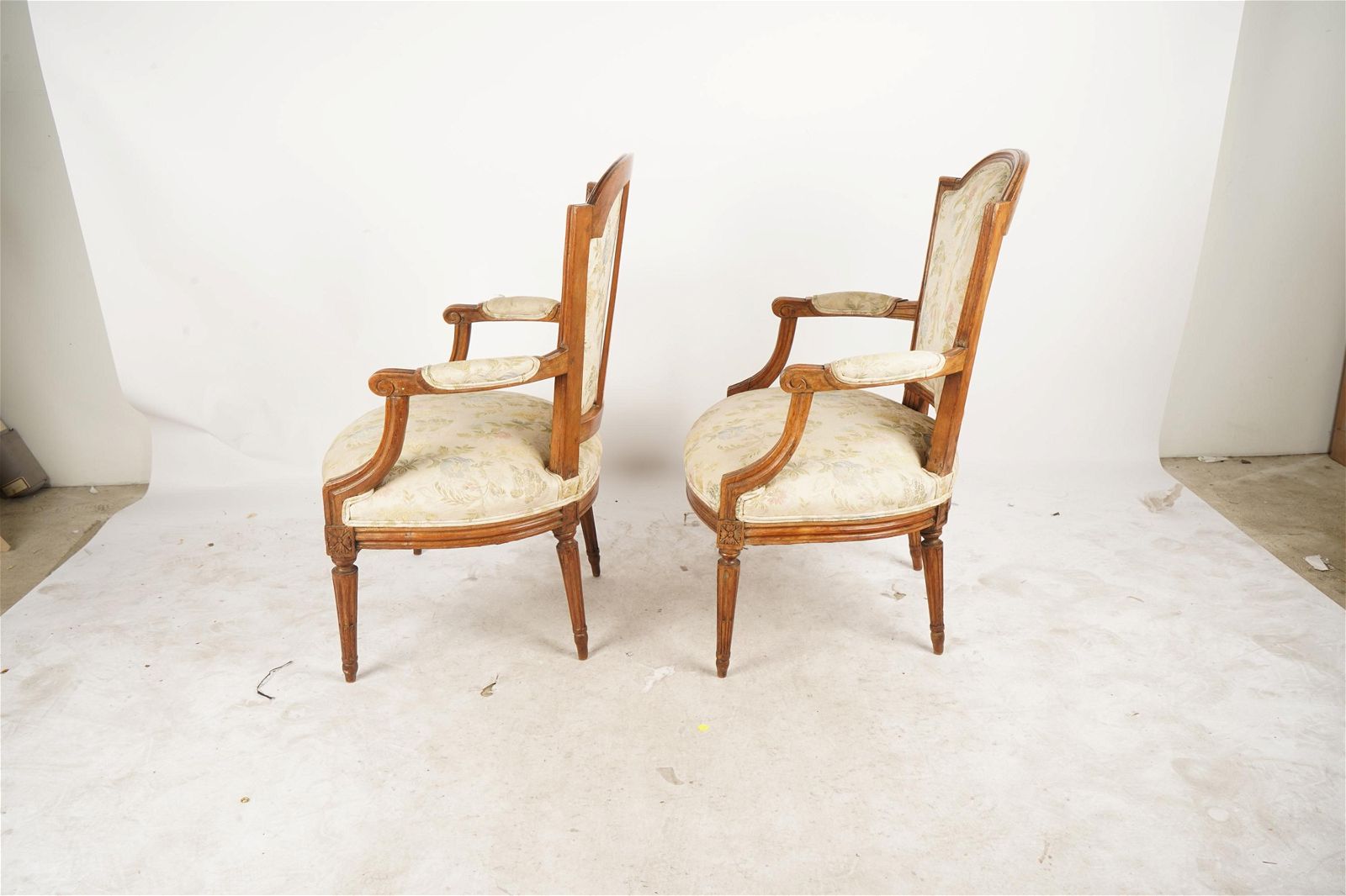 AF2-013: ANTIQUE PAIR OF LATE 19TH CENTURY FRENCH LOUIS XVI STYLE CARVED WALNUT FAUTEUILS