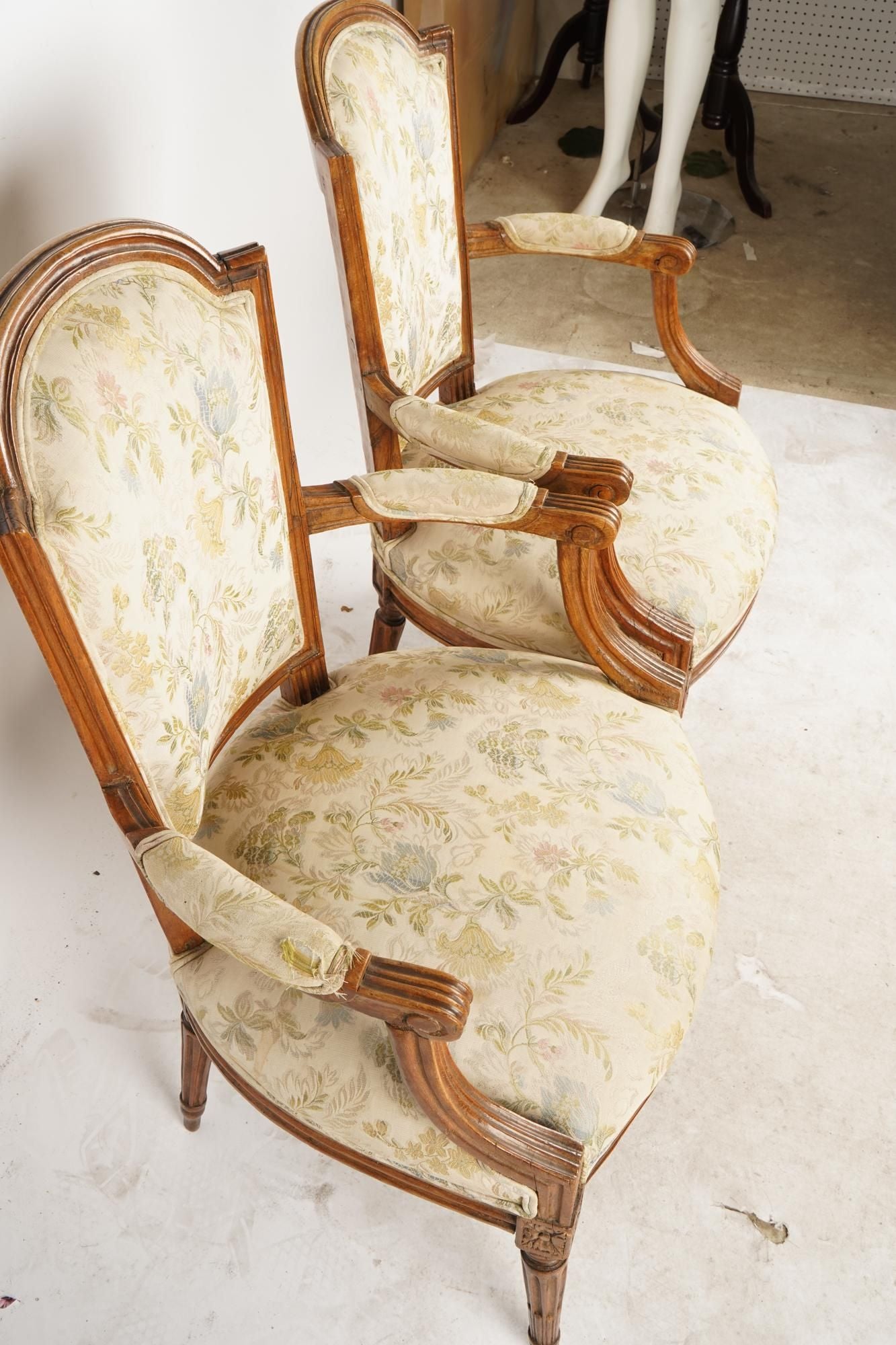 AF2-013: ANTIQUE PAIR OF LATE 19TH CENTURY FRENCH LOUIS XVI STYLE CARVED WALNUT FAUTEUILS