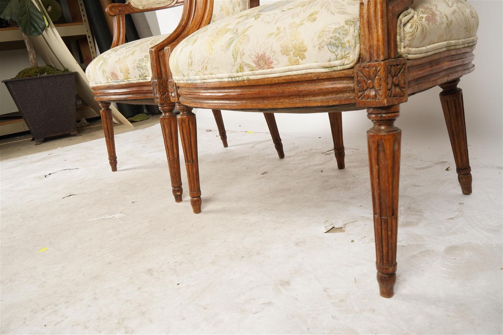 AF2-013: ANTIQUE PAIR OF LATE 19TH CENTURY FRENCH LOUIS XVI STYLE CARVED WALNUT FAUTEUILS