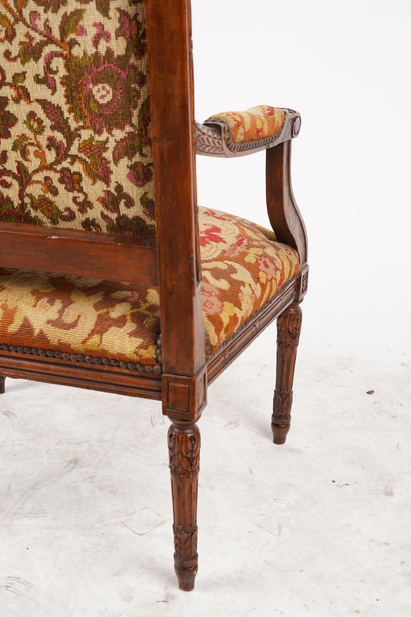 AF2-012: ANTIQUE LATE 19TH CENTURY FRENCH LOUIS XVI STYLE CARVED WALNUT FAUTEUIL