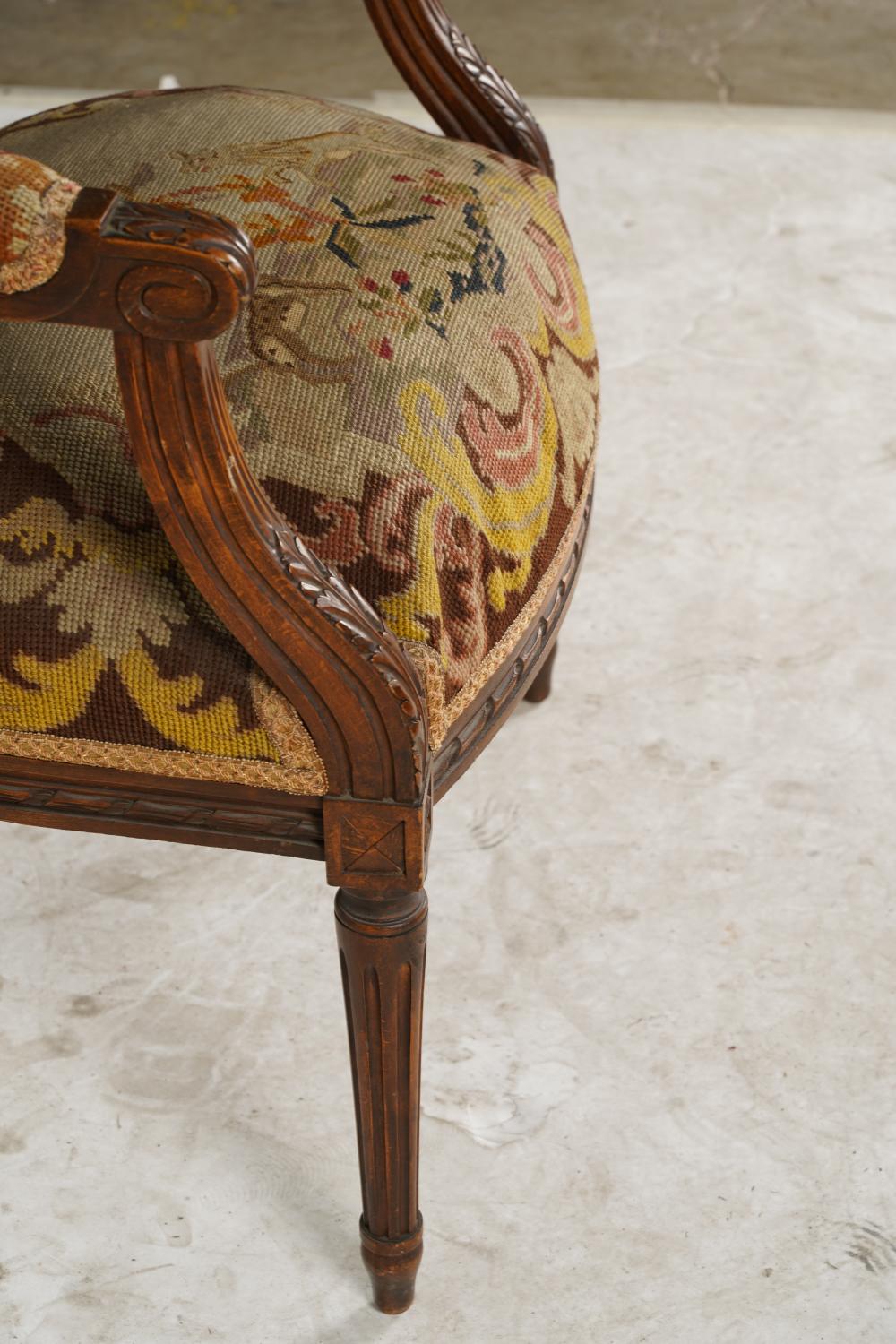 AF2-024: ANTIQUE LATE 19TH C LOUIS XVI STYLE BEECHWOOD FAUTEUIL W/ NEEDLEPOINT UPHOLSTERY