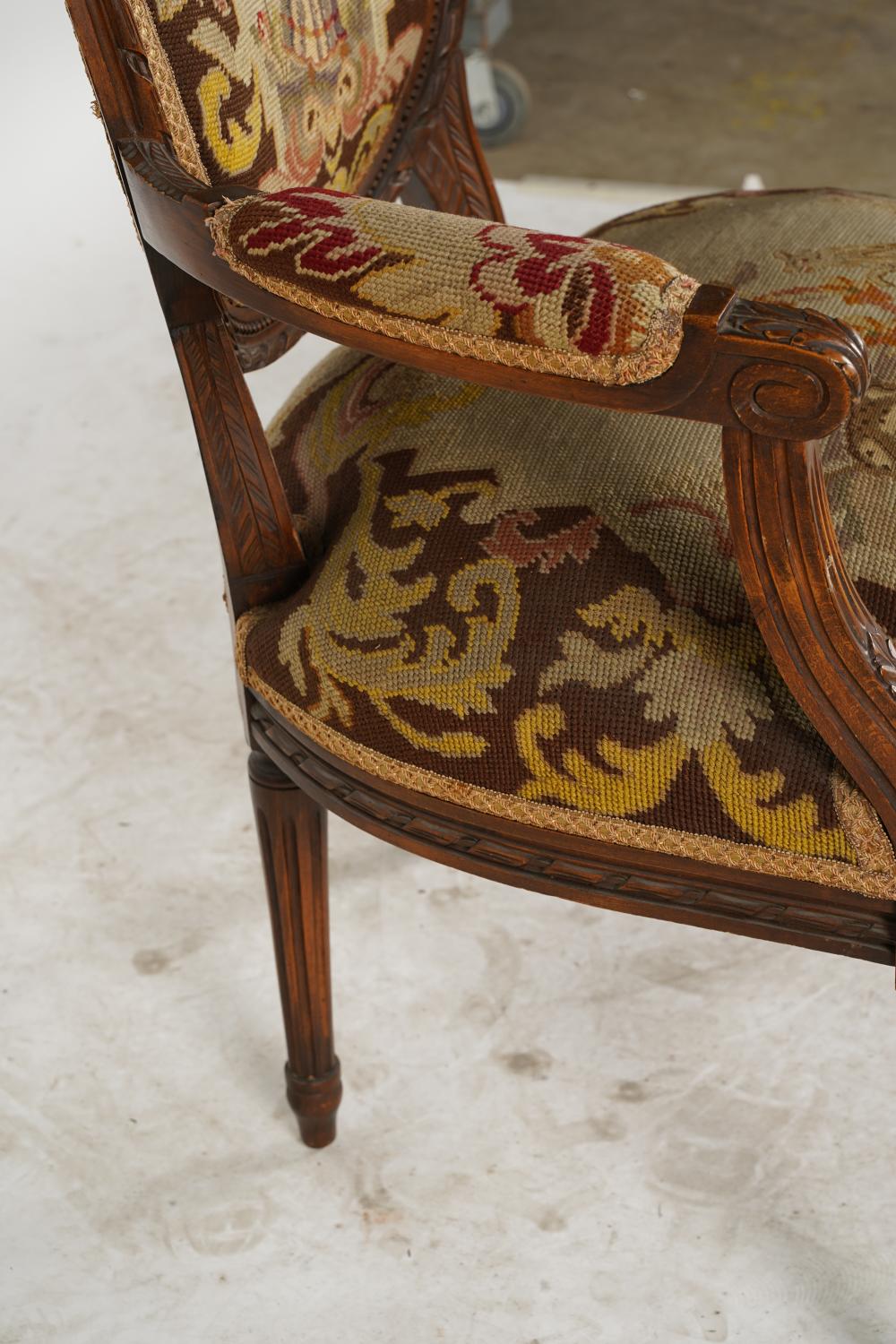 AF2-024: ANTIQUE LATE 19TH C LOUIS XVI STYLE BEECHWOOD FAUTEUIL W/ NEEDLEPOINT UPHOLSTERY