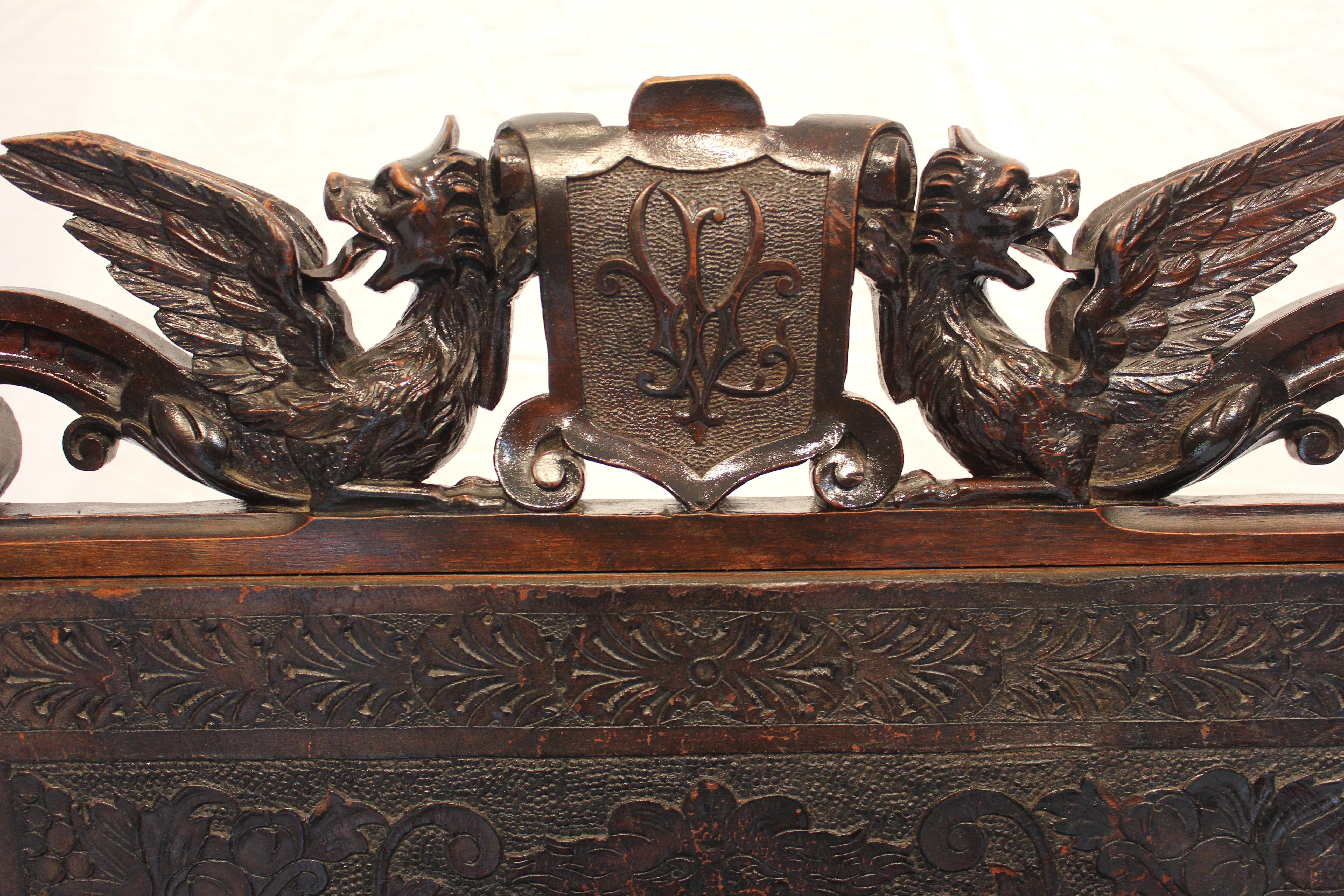 AF2-318: Antique Late 19th Century Highly Carved Walnut Spanish Colonial Arm Chair with Tooled Leather Upholstery